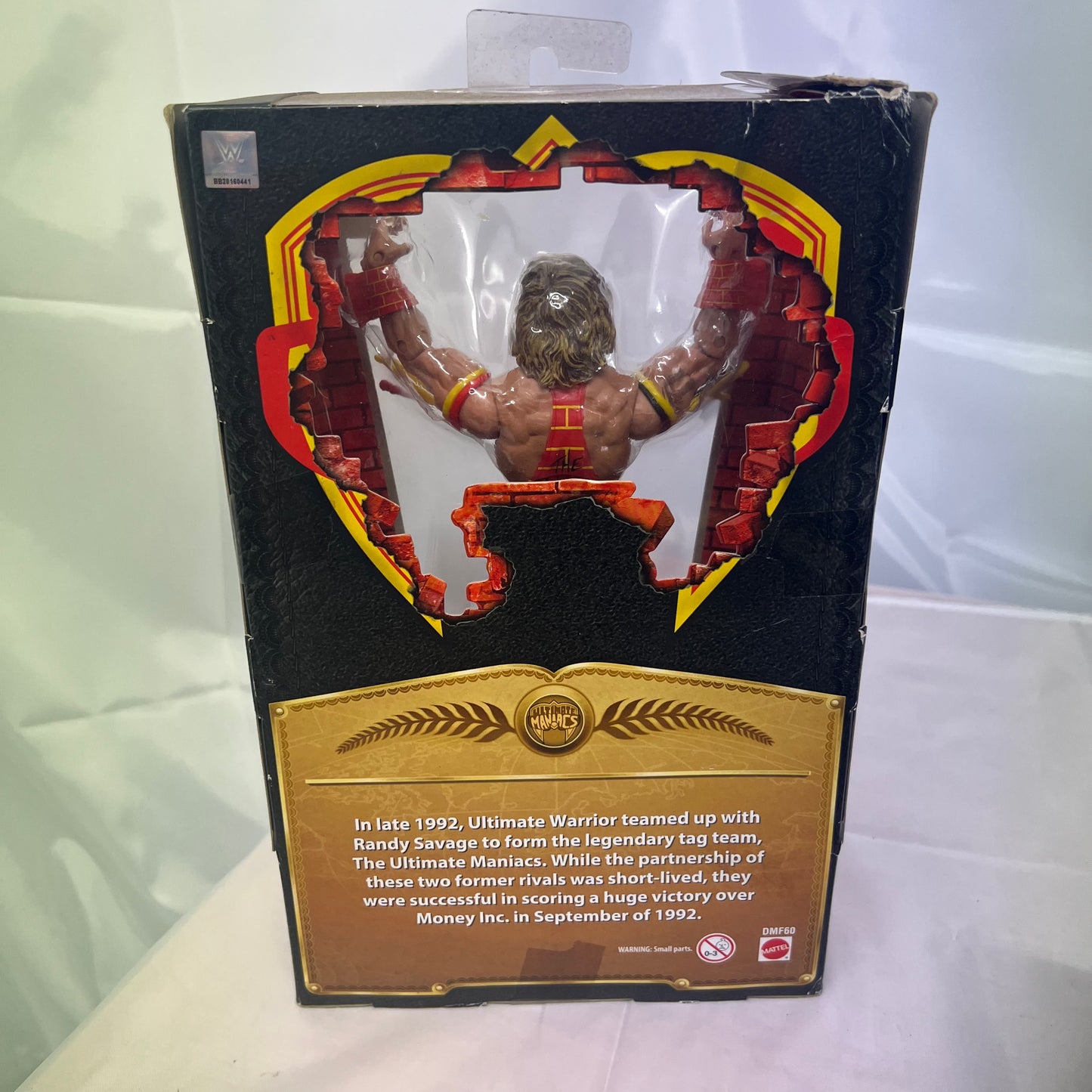 Ultimate Warrior (Maniacs) - WWE Defining Moments Action Figure Ripped Box
