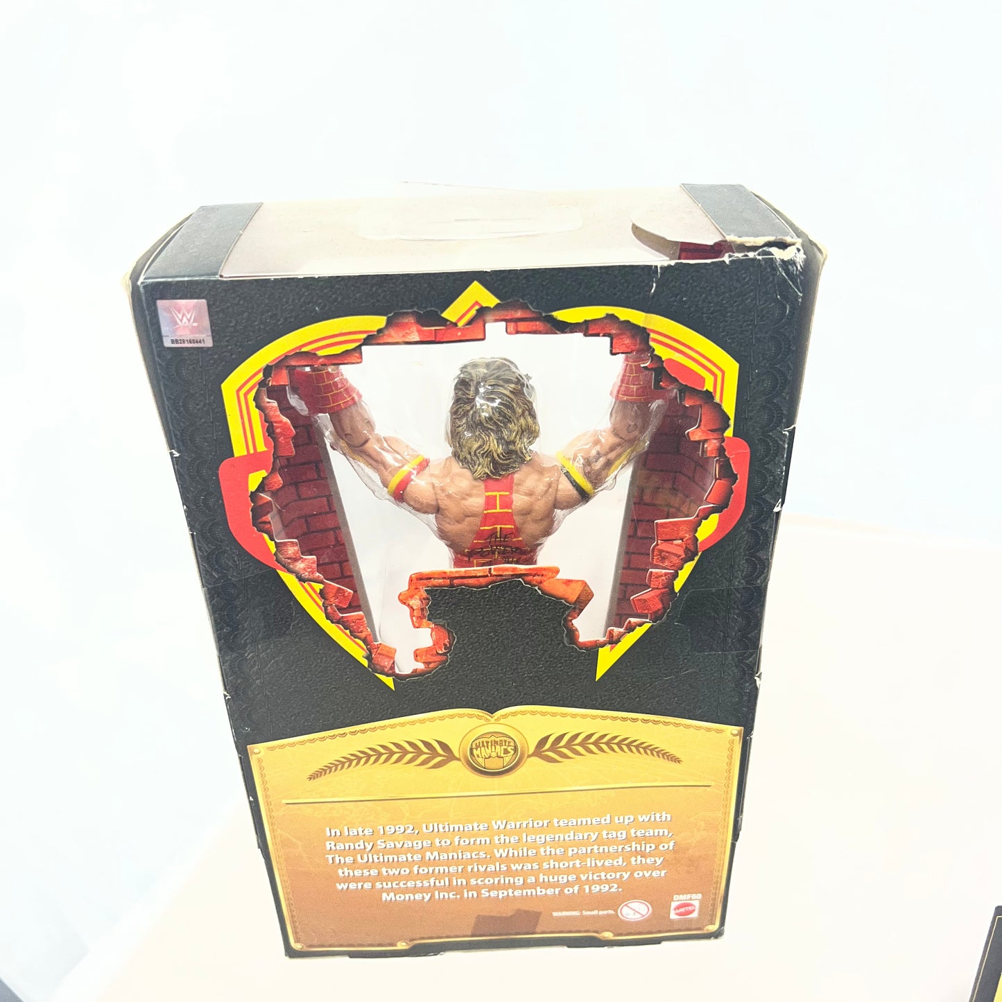 Ultimate Warrior (Maniacs) - WWE Defining Moments Action Figure Ripped Box